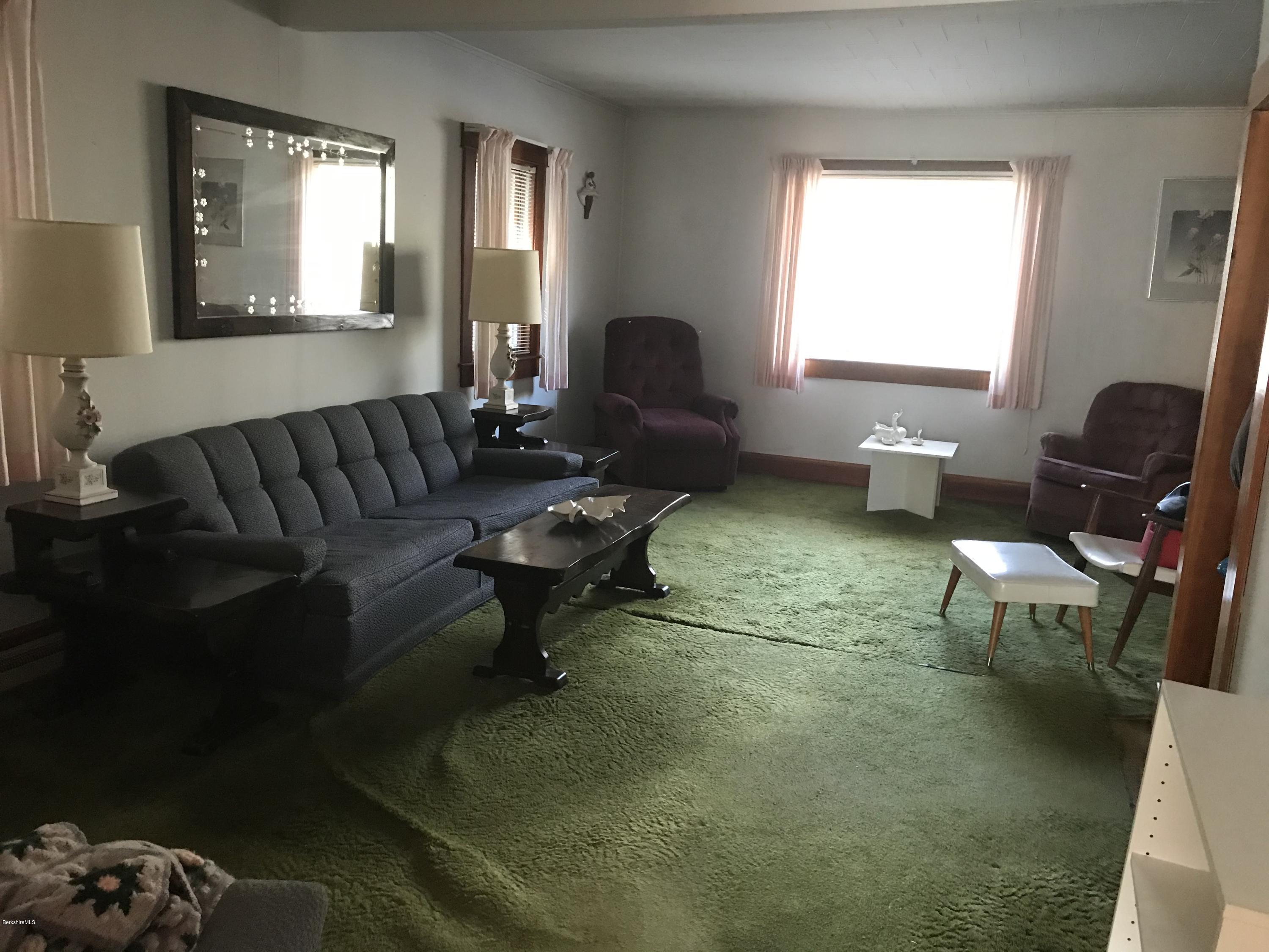 274 South County Road Florida, MA 01343 - Photo 8 of 16 a living room with furniture and a window