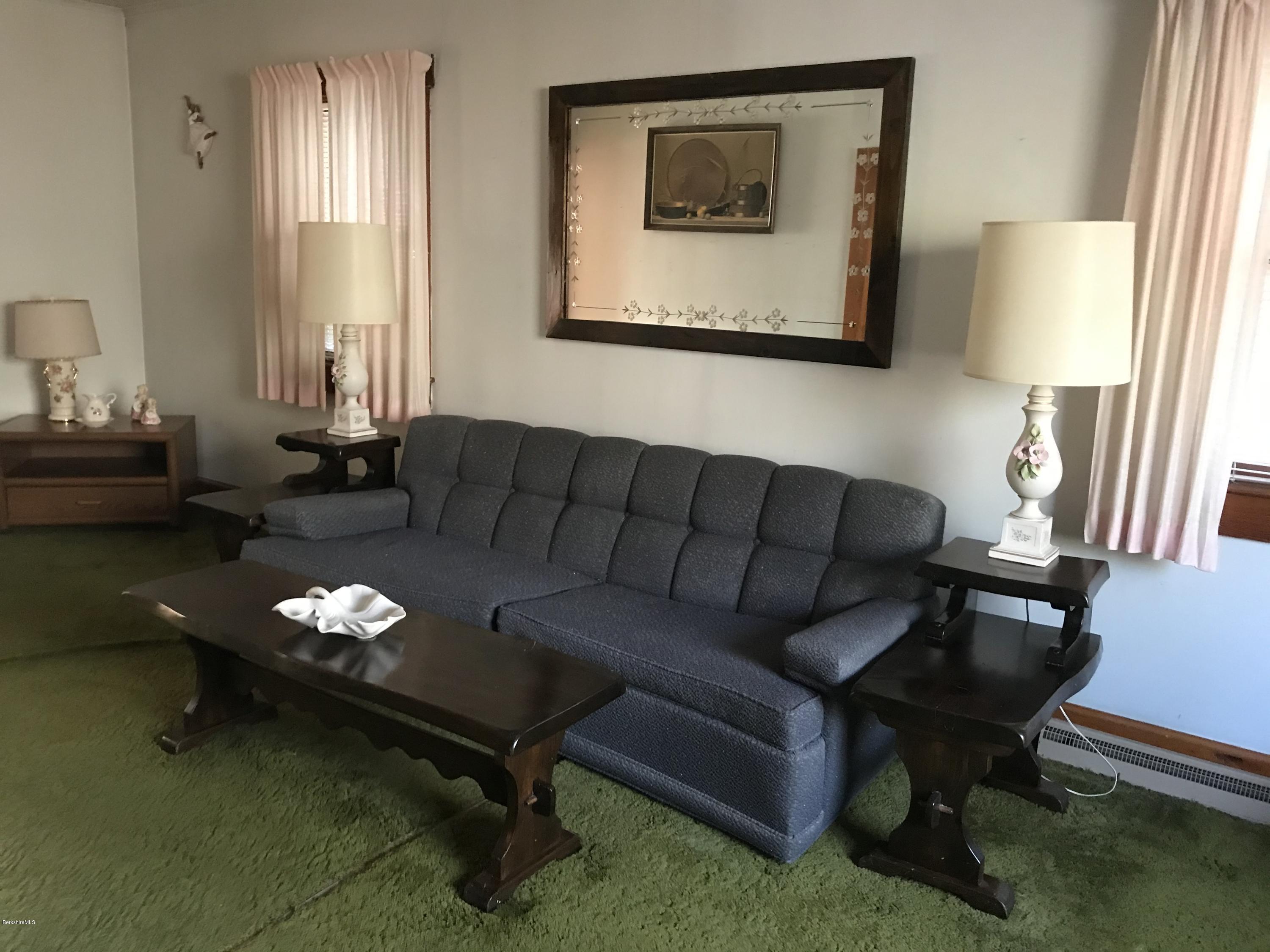 274 South County Road Florida, MA 01343 - Photo 9 of 16 a living room with furniture and a window
