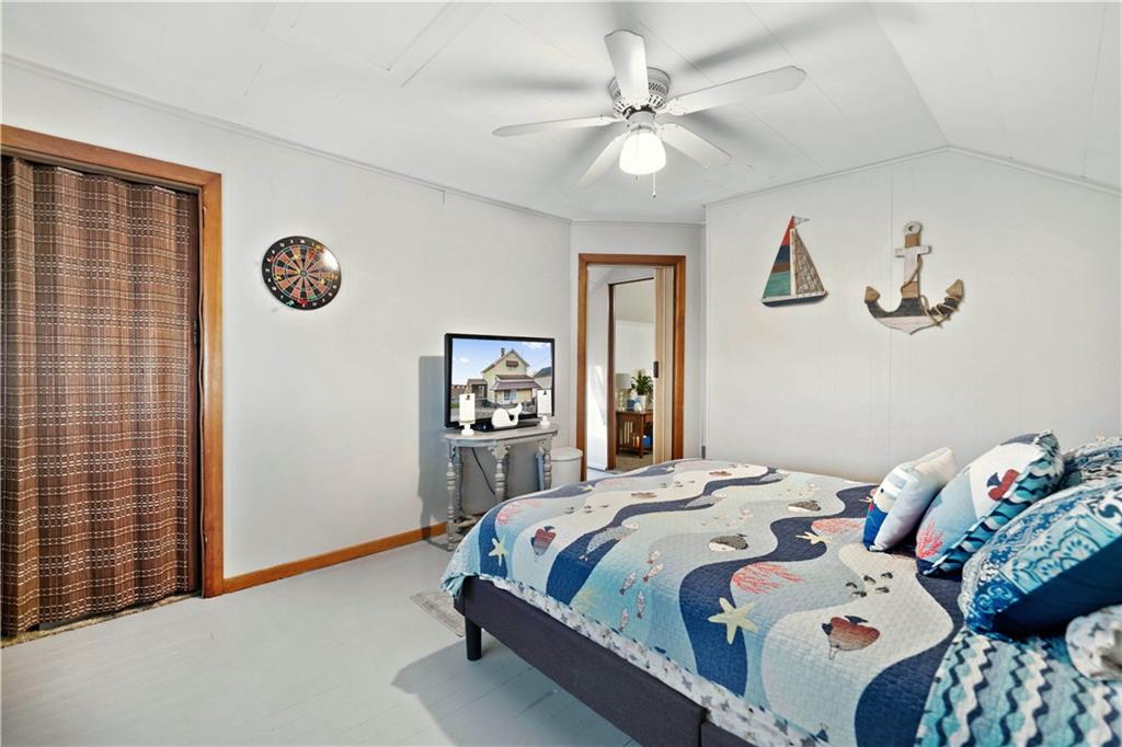 504 Oak Street Richeyville, PA 15358 - Photo 13 of 19 a bedroom with a bed and a window