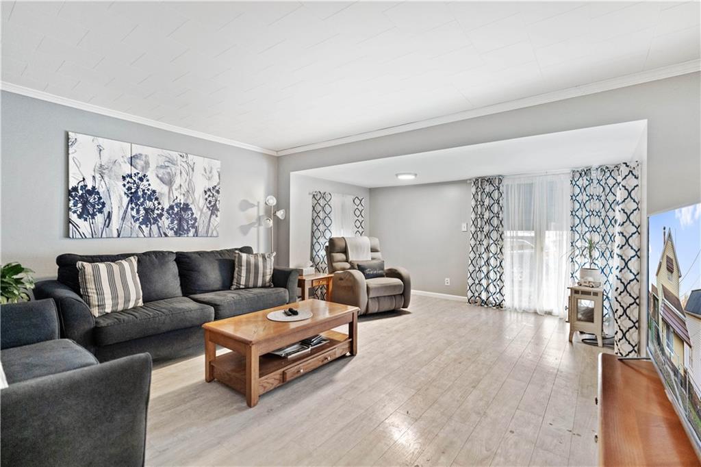 504 Oak Street Richeyville, PA 15358 - Photo 2 of 19 a living room with furniture and a painting on the wall