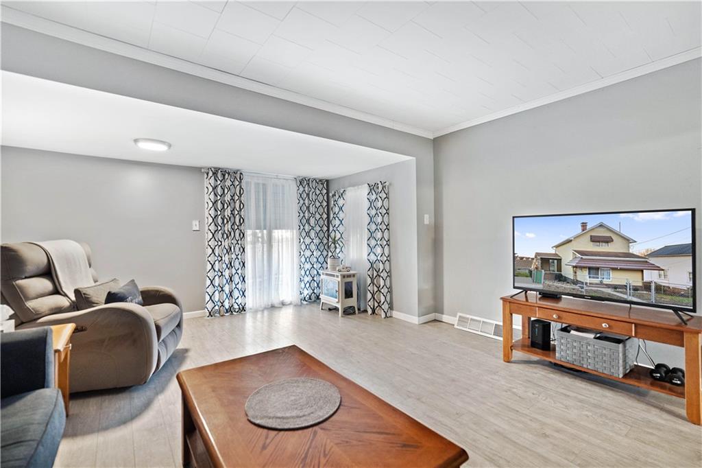 504 Oak Street Richeyville, PA 15358 - Photo 8 of 19 a living room with furniture and a couch