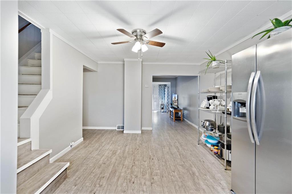 504 Oak Street Richeyville, PA 15358 - Photo 9 of 19 a view of a livingroom with furniture and a ceiling fan