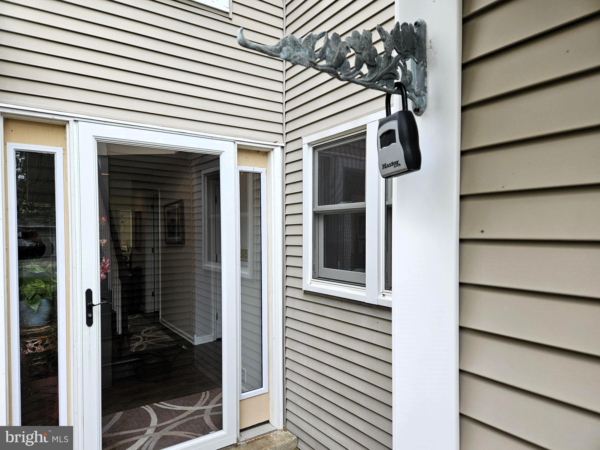118 Red Pine Circle Newark, DE 19711 - Photo 32 of 32 a view of a house with a door and a window