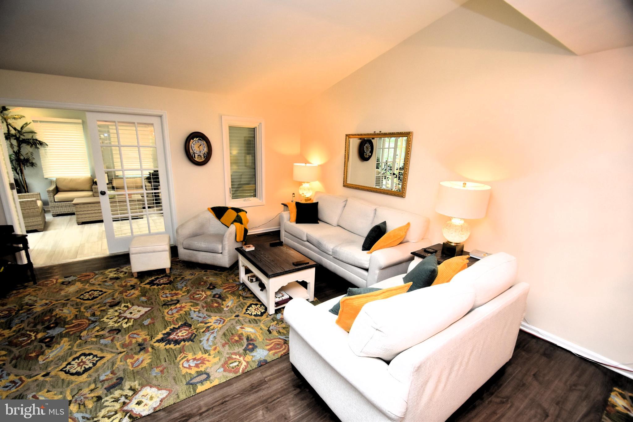 118 Red Pine Circle Newark, DE 19711 - Photo 5 of 32 a living room with furniture and a large window