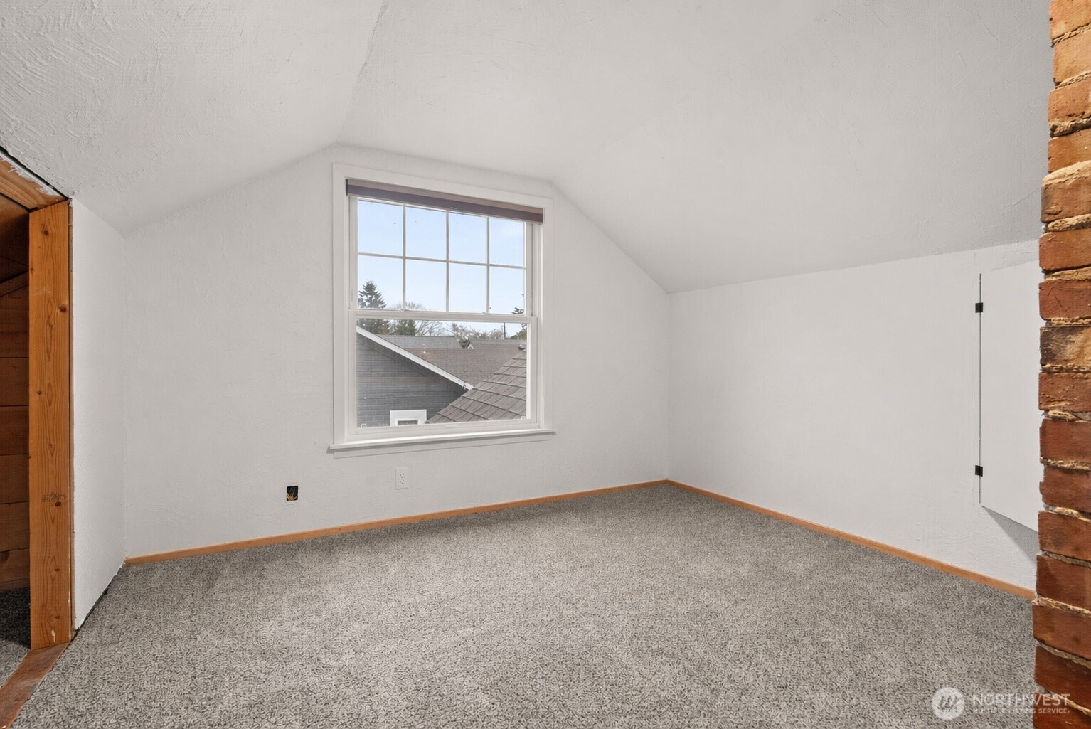 1412 Everett Street Sumner, WA 98390 - Photo 22 of 33 an empty room with a window