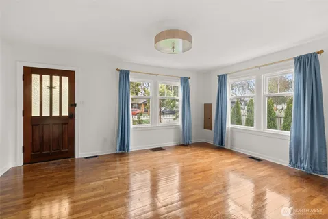 a view of an empty room with a window