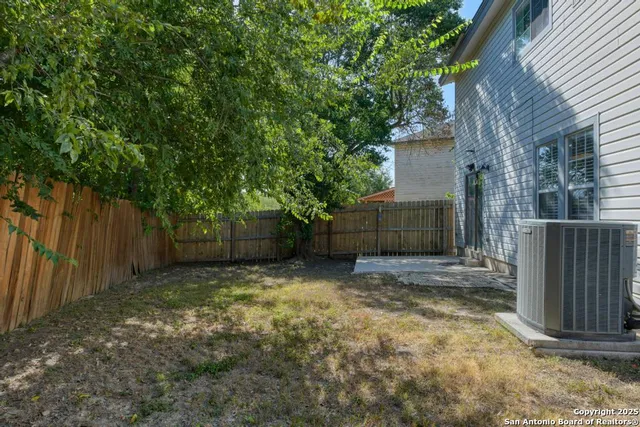 a house with trees in the background