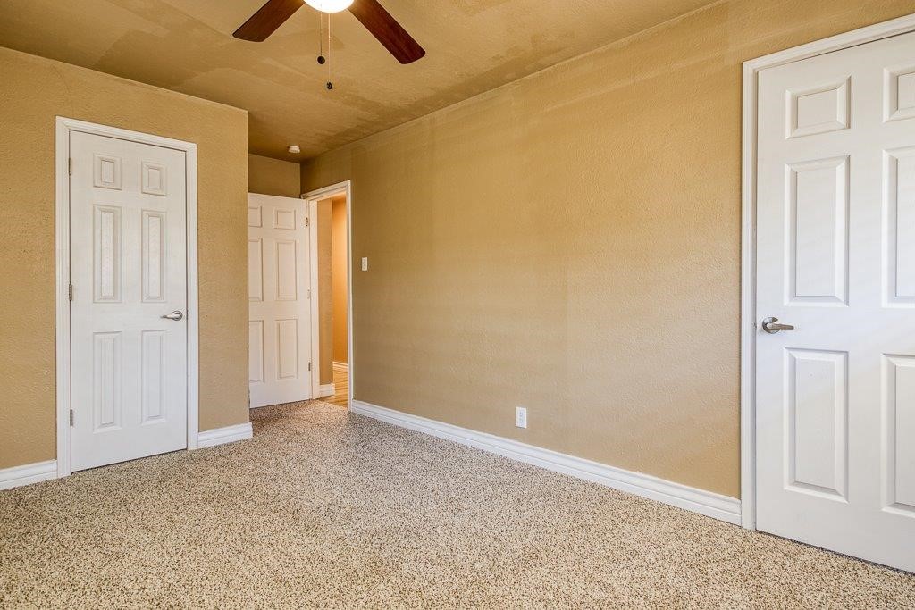 111 Chase Drive Portland, TX 78374 - Photo 14 of 26 an empty room with chandelier fan