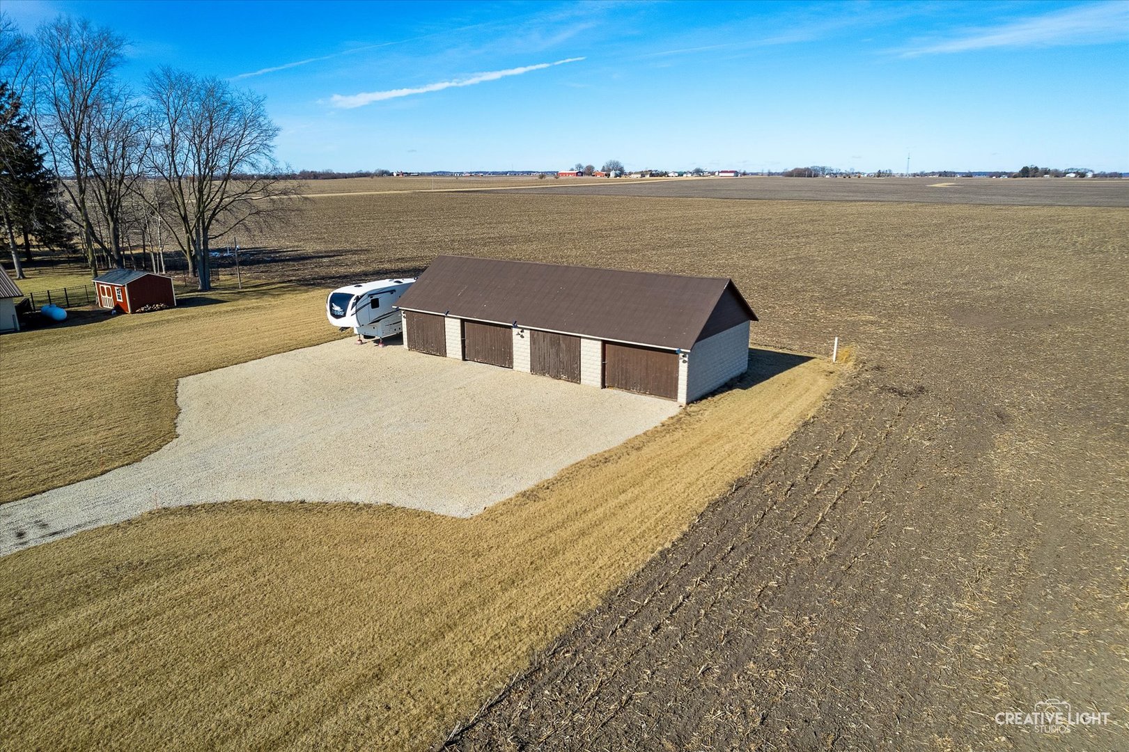 11626A Church Road Yorkville, IL 60560 - Photo 42 of 42 a view of ocean with a building in the background