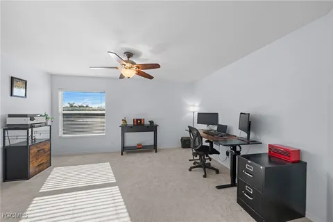 a bedroom with furniture and a window