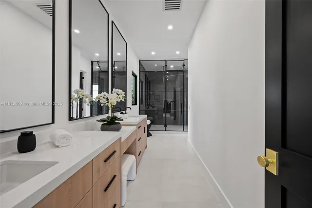 a view of a livingroom with furniture and a potted plant