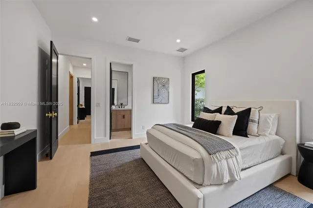 an aerial view of a house with a garden