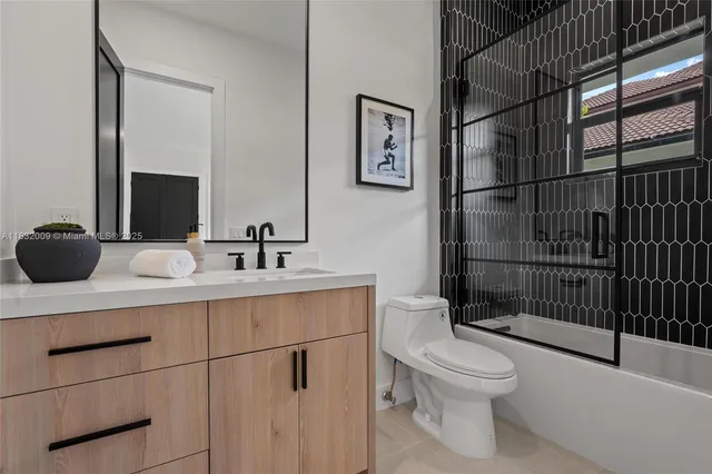 a view of a room with sliding glass door and balcony
