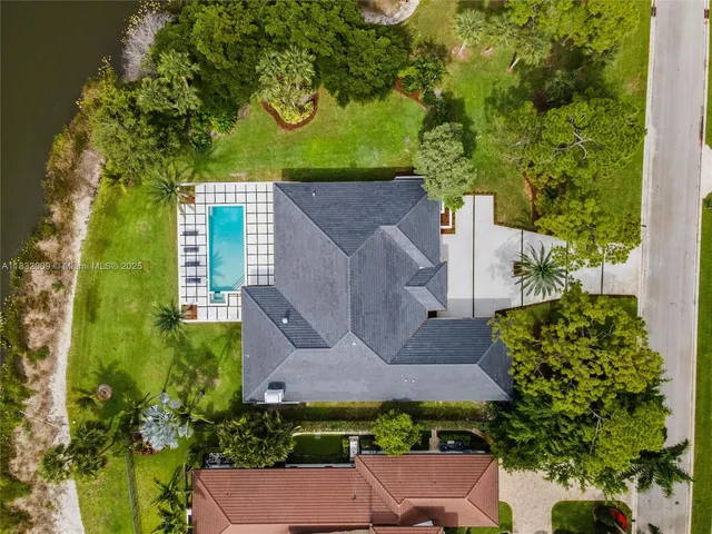 a view of swimming pool with chairs