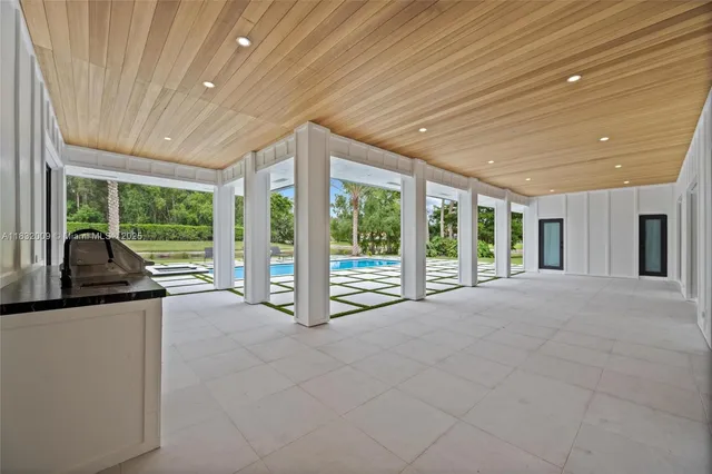 a view of a house with swimming pool