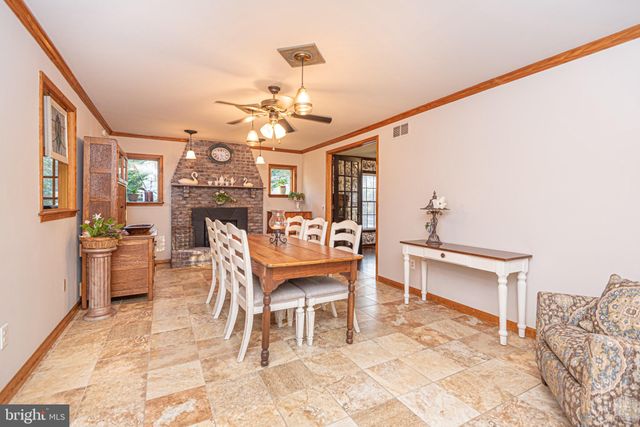 a kitchen with a refrigerator and a sink