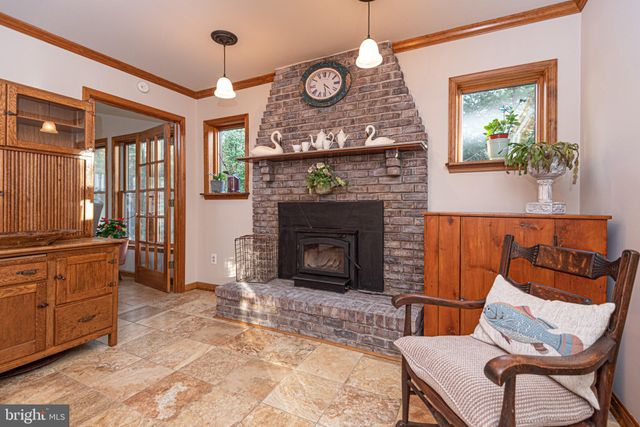 a kitchen with stainless steel appliances granite countertop a refrigerator and a stove