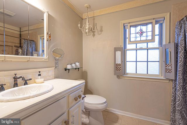 a view of a chairs and table in the patio