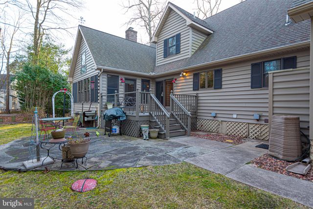 a car parked in front of a house