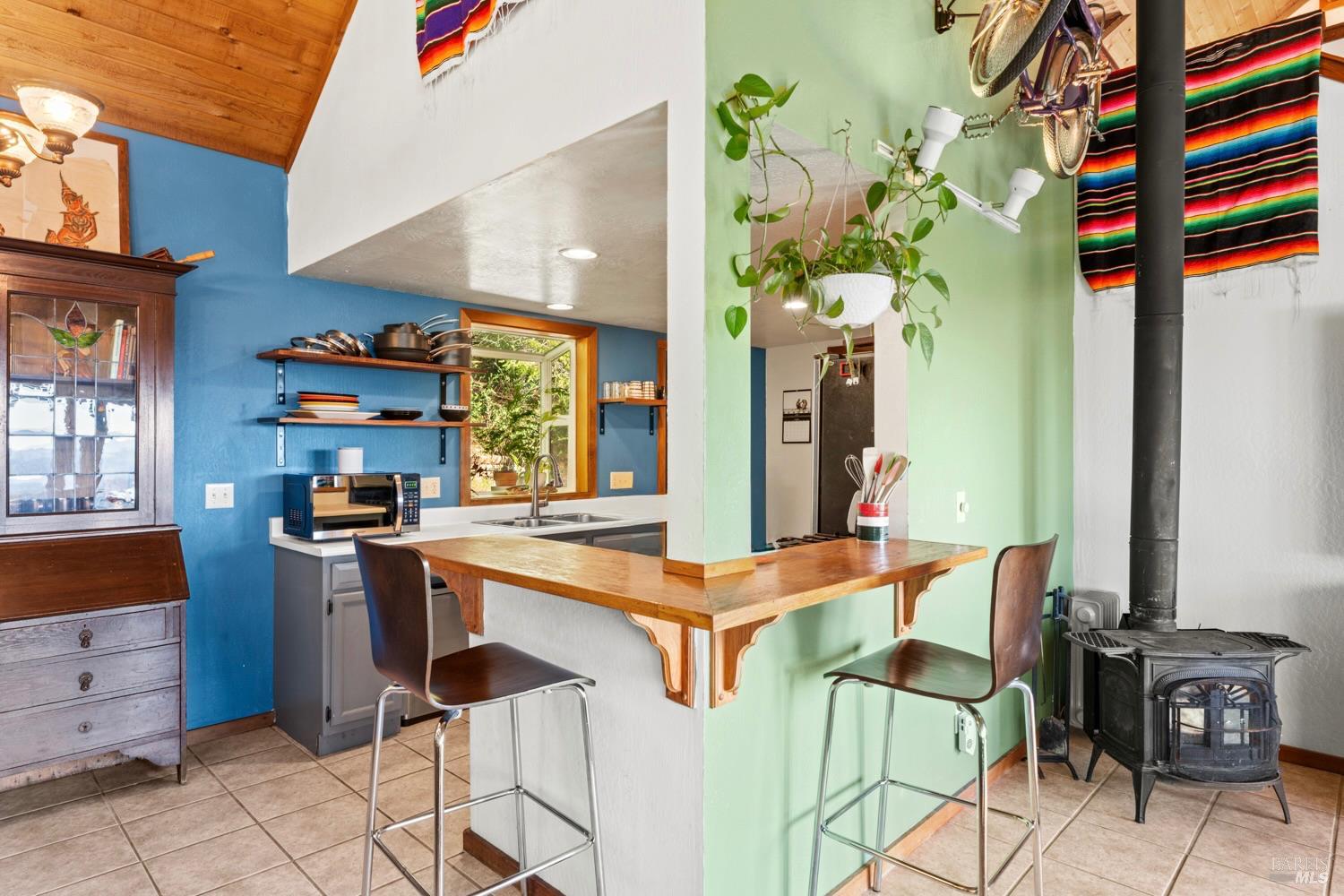 40401 Little River-Airport Road Little River, CA 95456 - Photo 12 of 47 a kitchen with stainless steel appliances granite countertop a sink and a stove