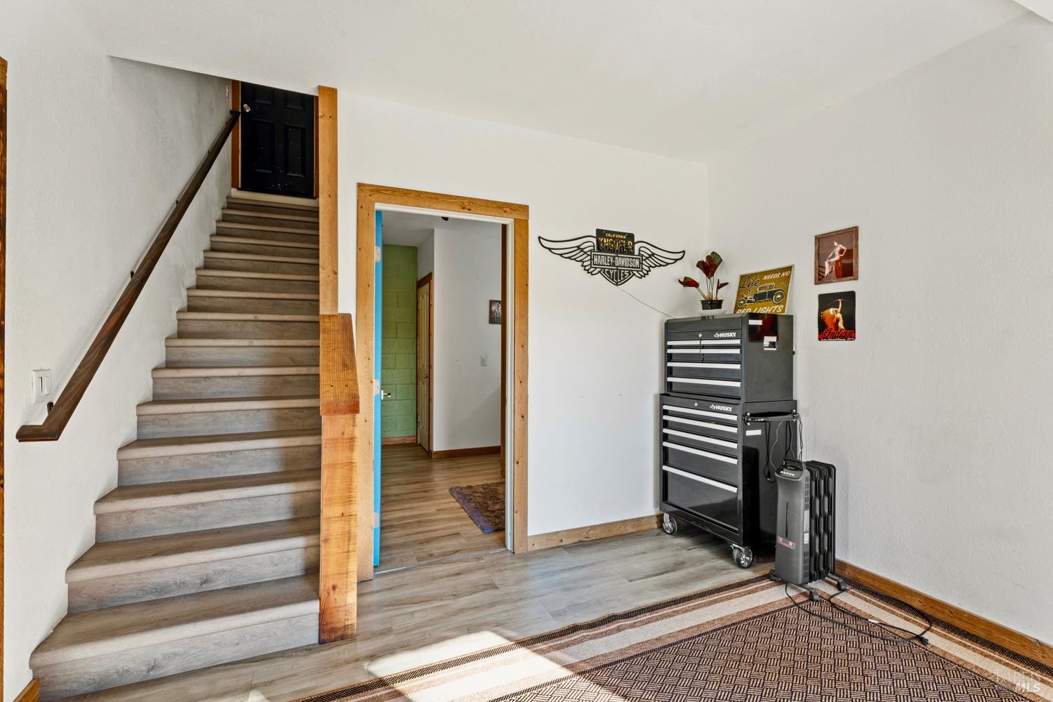40401 Little River-Airport Road Little River, CA 95456 - Photo 15 of 47 a view of a livingroom with wooden floor and stairs