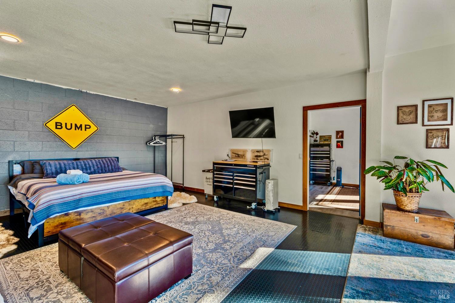 40401 Little River-Airport Road Little River, CA 95456 - Photo 19 of 47 a living room with furniture and a flat screen tv