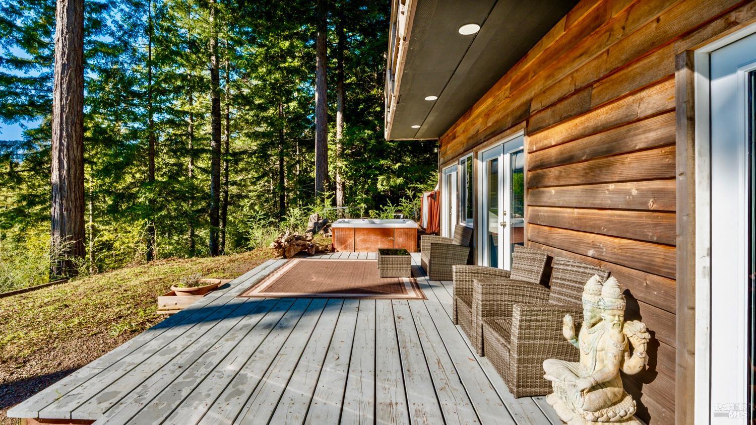40401 Little River-Airport Road Little River, CA 95456 - Photo 20 of 47 a view of balcony with wooden floor and outdoor seating