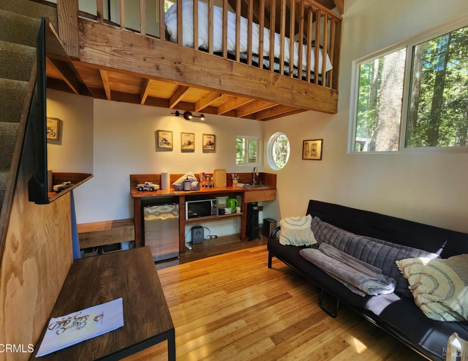 40401 Little River-Airport Road Little River, CA 95456 - Photo 29 of 47 a living room with furniture and a flat screen tv