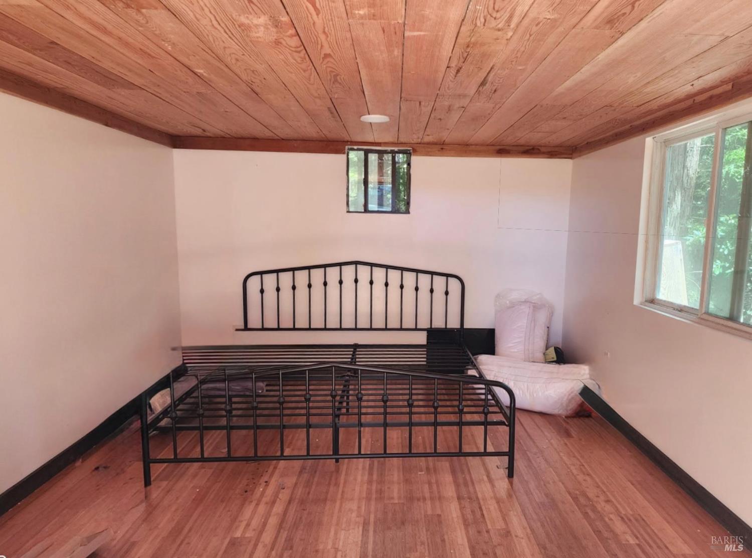 40401 Little River-Airport Road Little River, CA 95456 - Photo 39 of 47 a bedroom with a bed and window