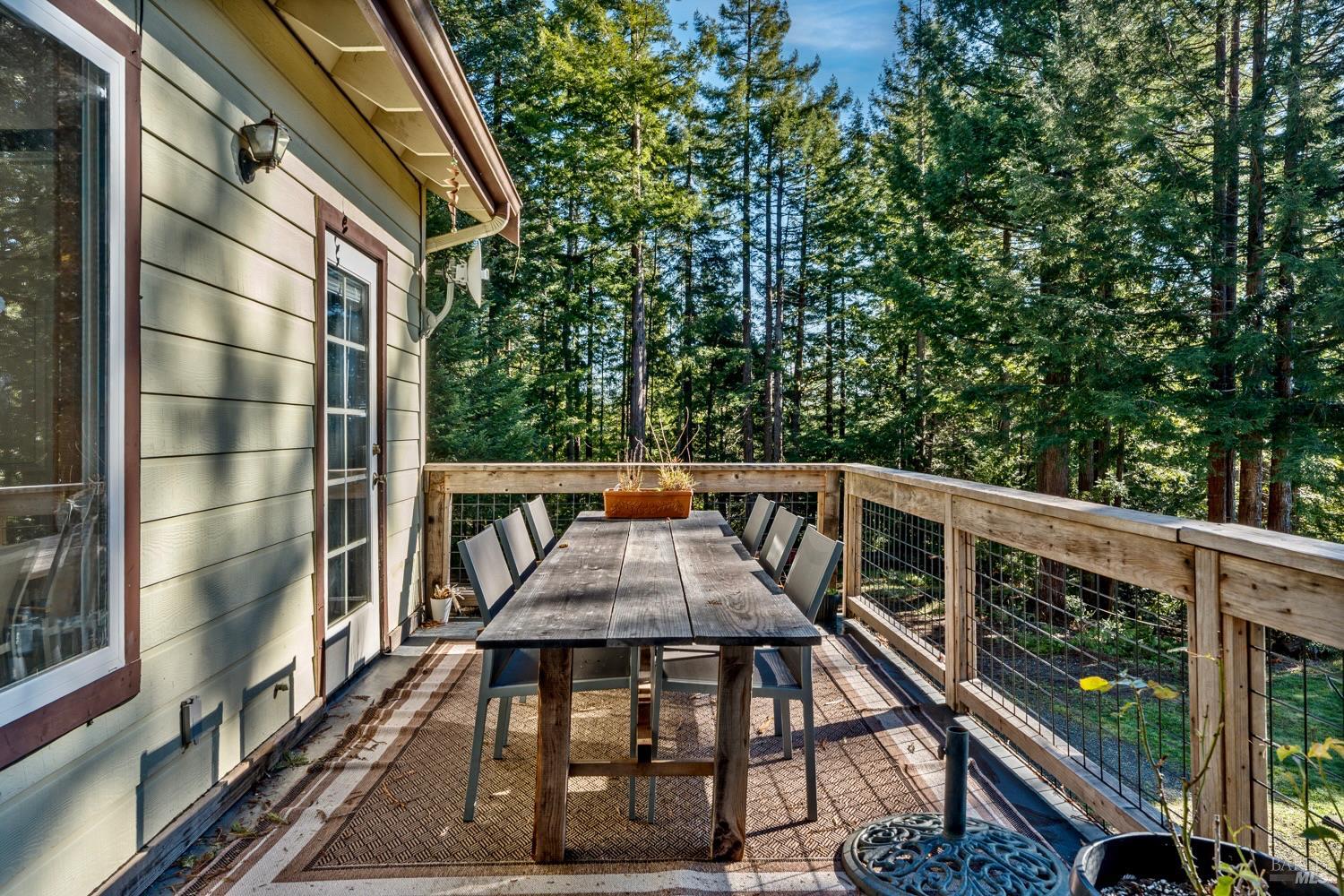 40401 Little River-Airport Road Little River, CA 95456 - Photo 9 of 47 a view of balcony with wooden floor and outdoor seating