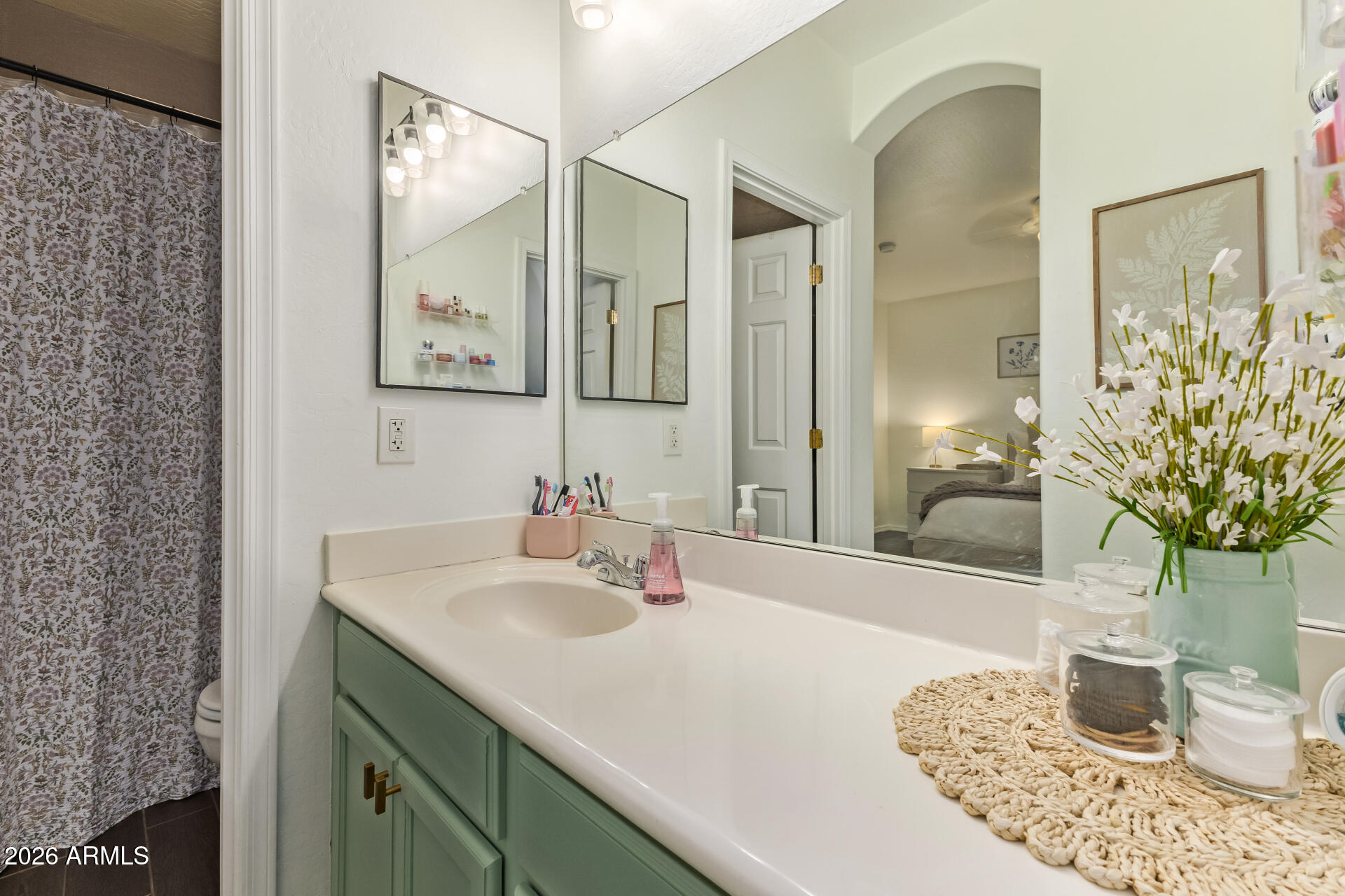 2600 East Springfield Place, Unit 34 Chandler, AZ 85286 - Photo 12 of 38 a bathroom with a sink and a mirror