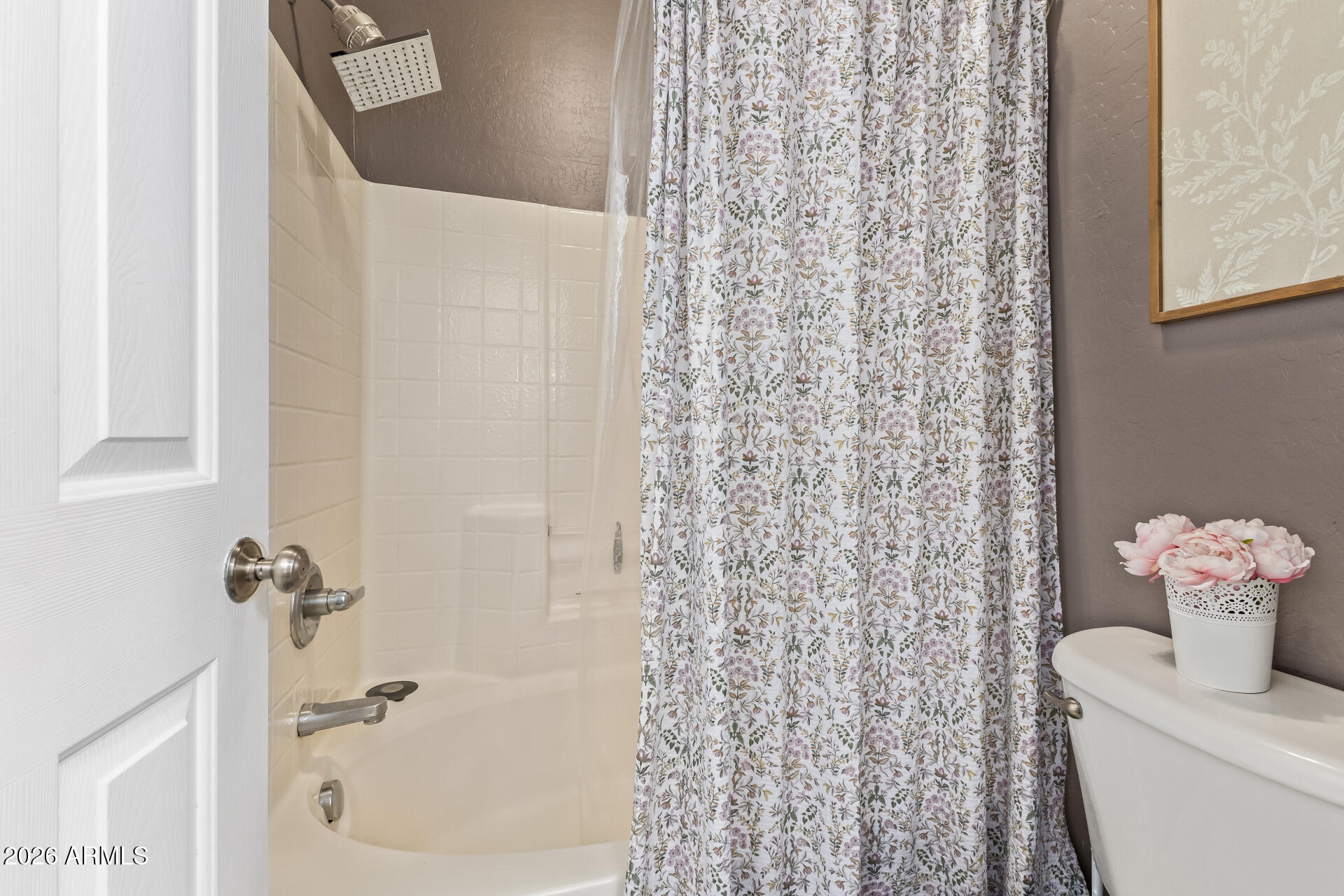 2600 East Springfield Place, Unit 34 Chandler, AZ 85286 - Photo 13 of 38 a bathroom with a shower curtain