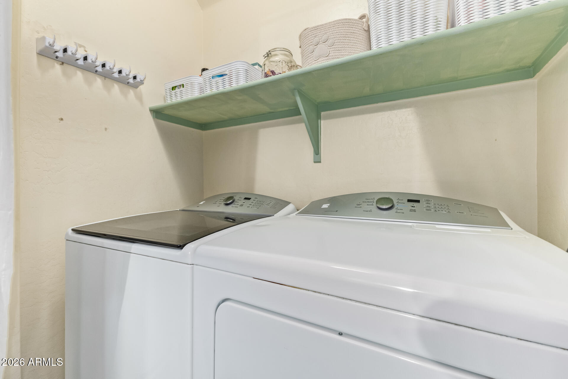 2600 East Springfield Place, Unit 34 Chandler, AZ 85286 - Photo 22 of 38 a utility room with dryer and washer