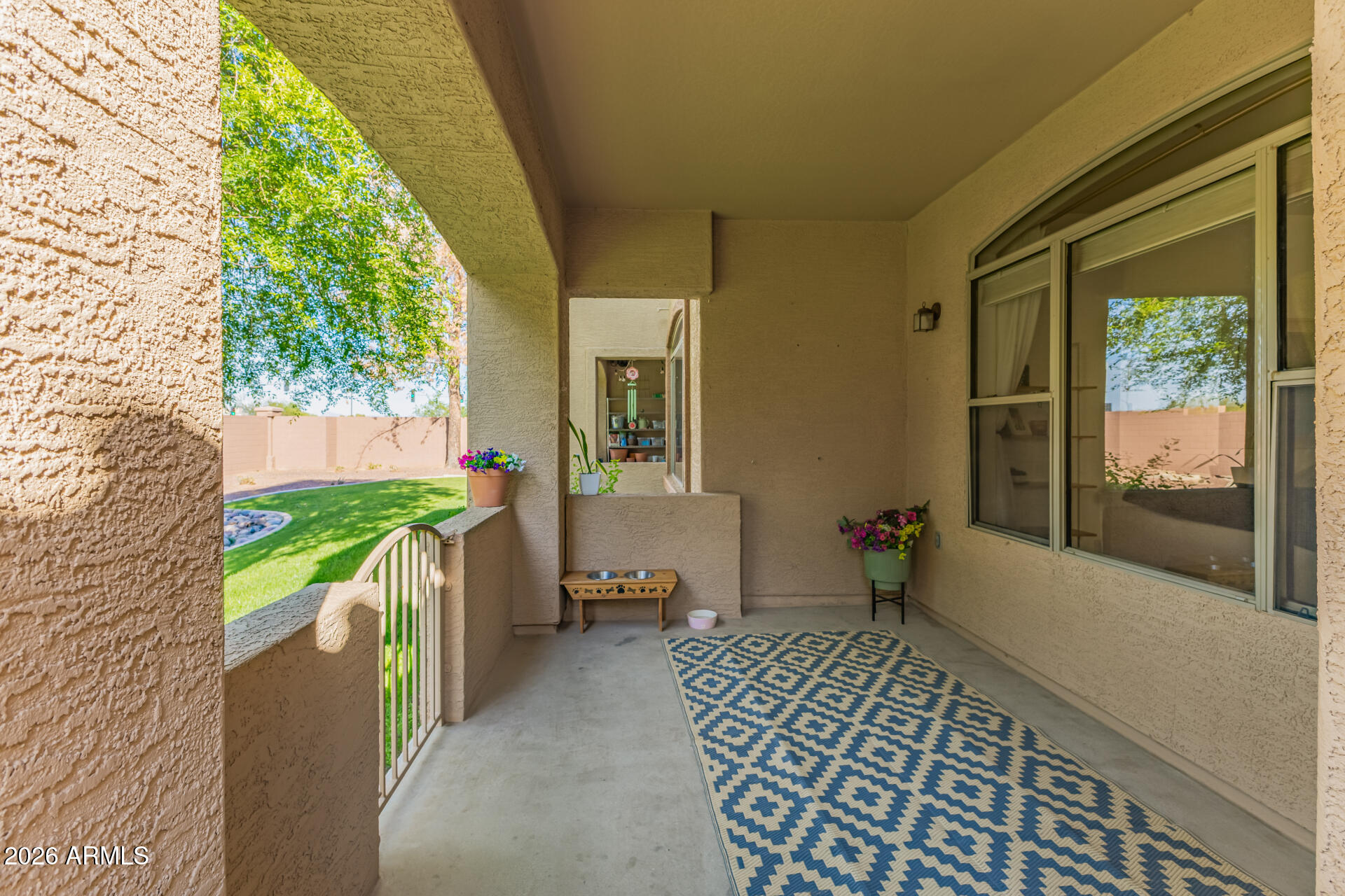 2600 East Springfield Place, Unit 34 Chandler, AZ 85286 - Photo 28 of 38 a house view with a garden space
