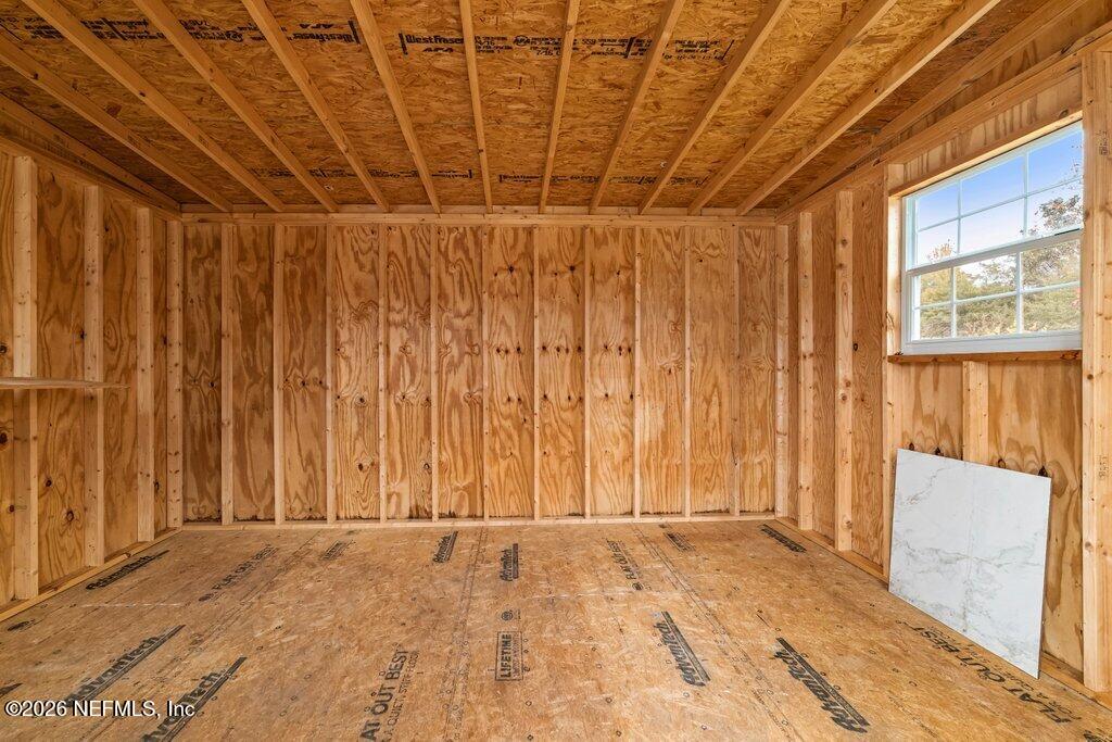6731 Sans Souci Road Jacksonville, FL 32216 - Photo 25 of 27 a view of a room with a wooden door