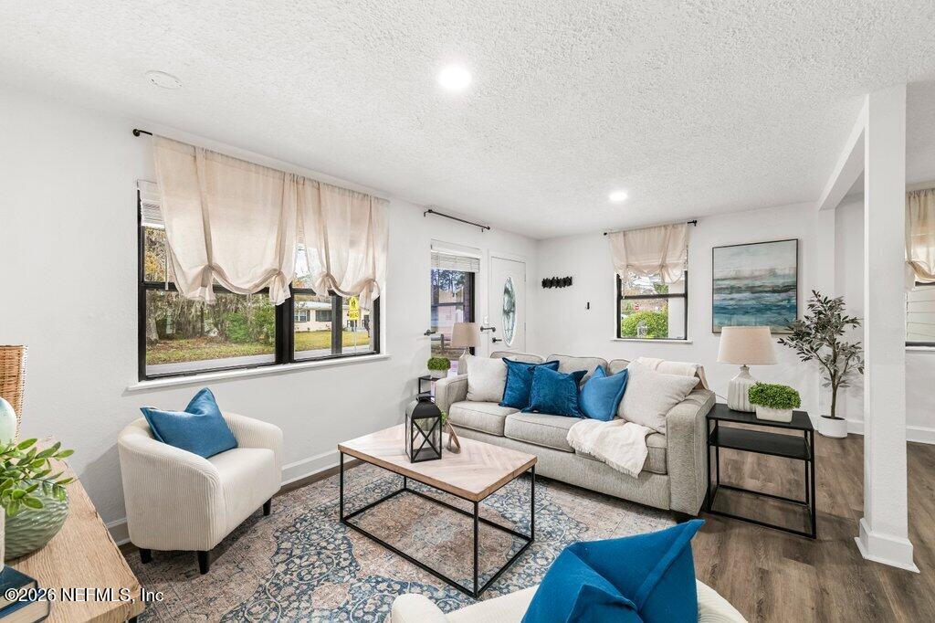 6731 Sans Souci Road Jacksonville, FL 32216 - Photo 3 of 27 a living room with furniture and a large window
