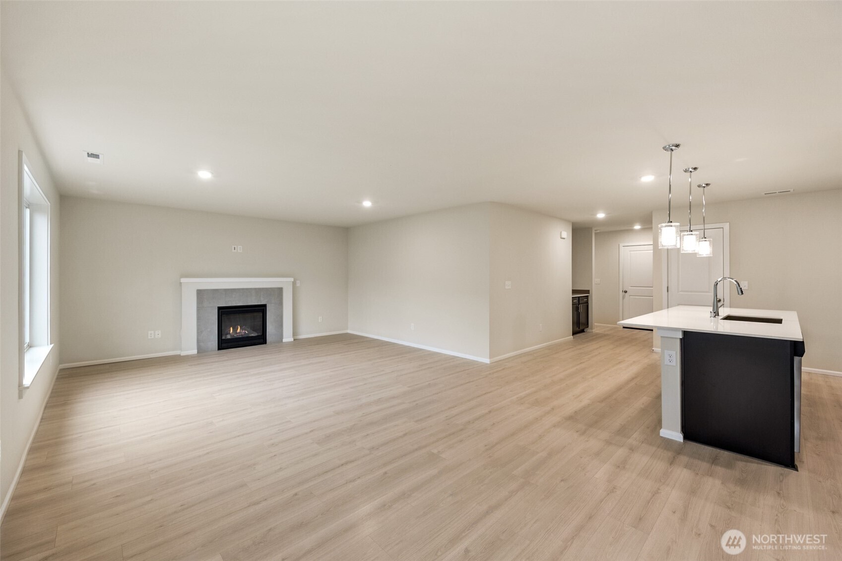 107 Willowbrook Drive Chehalis, WA 98532 - Photo 12 of 30 a view of an empty room with a fireplace and a window