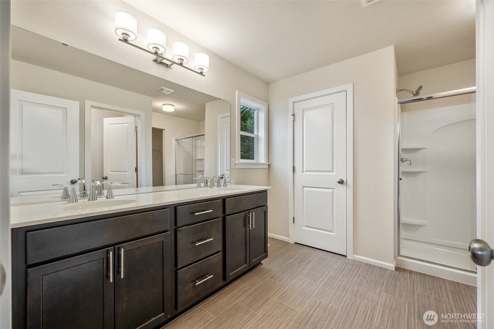 107 Willowbrook Drive Chehalis, WA 98532 - Photo 25 of 30 a bathroom with a double vanity sink and mirror with shower