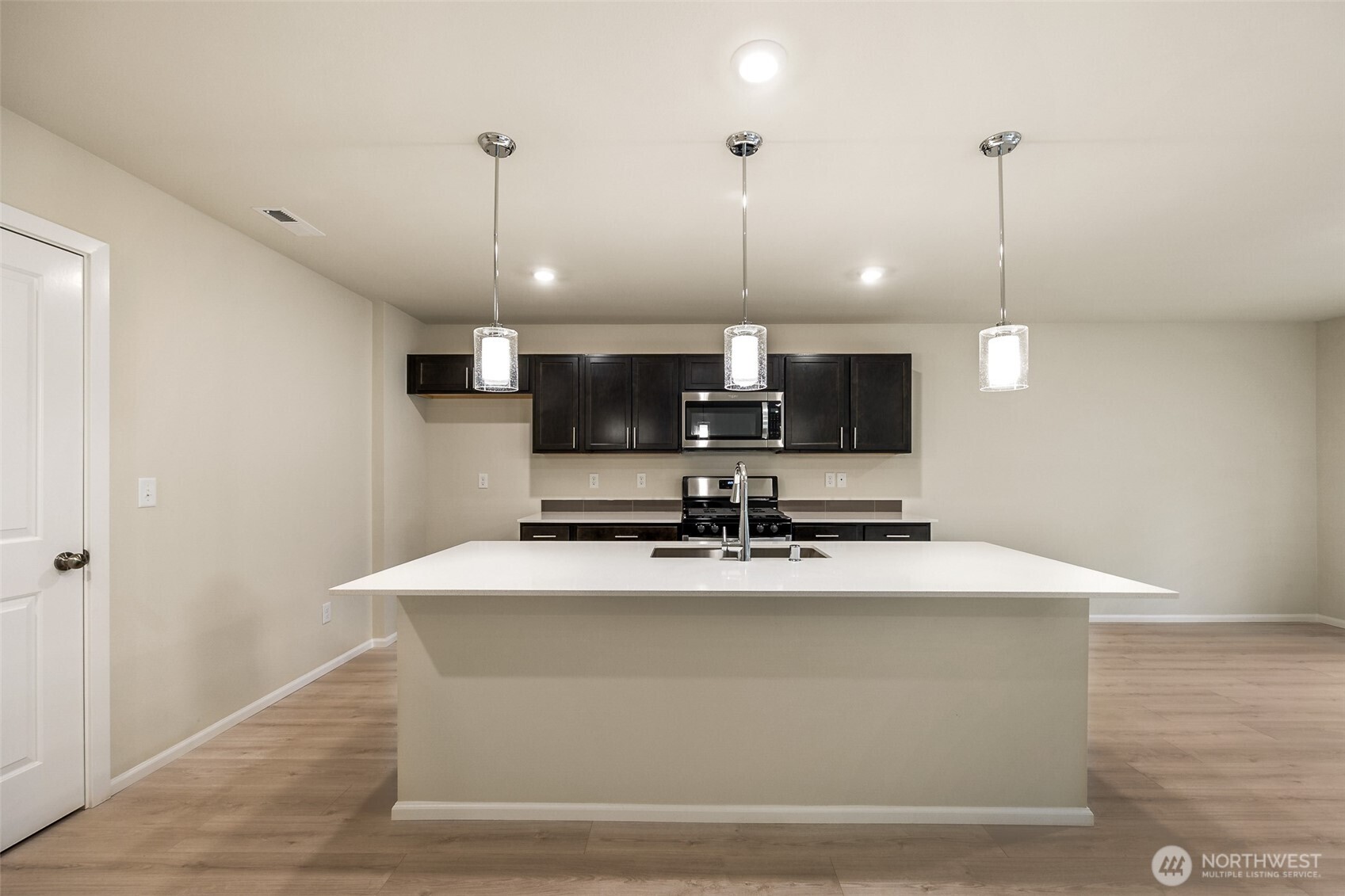 107 Willowbrook Drive Chehalis, WA 98532 - Photo 7 of 30 a kitchen with kitchen island sink and center island