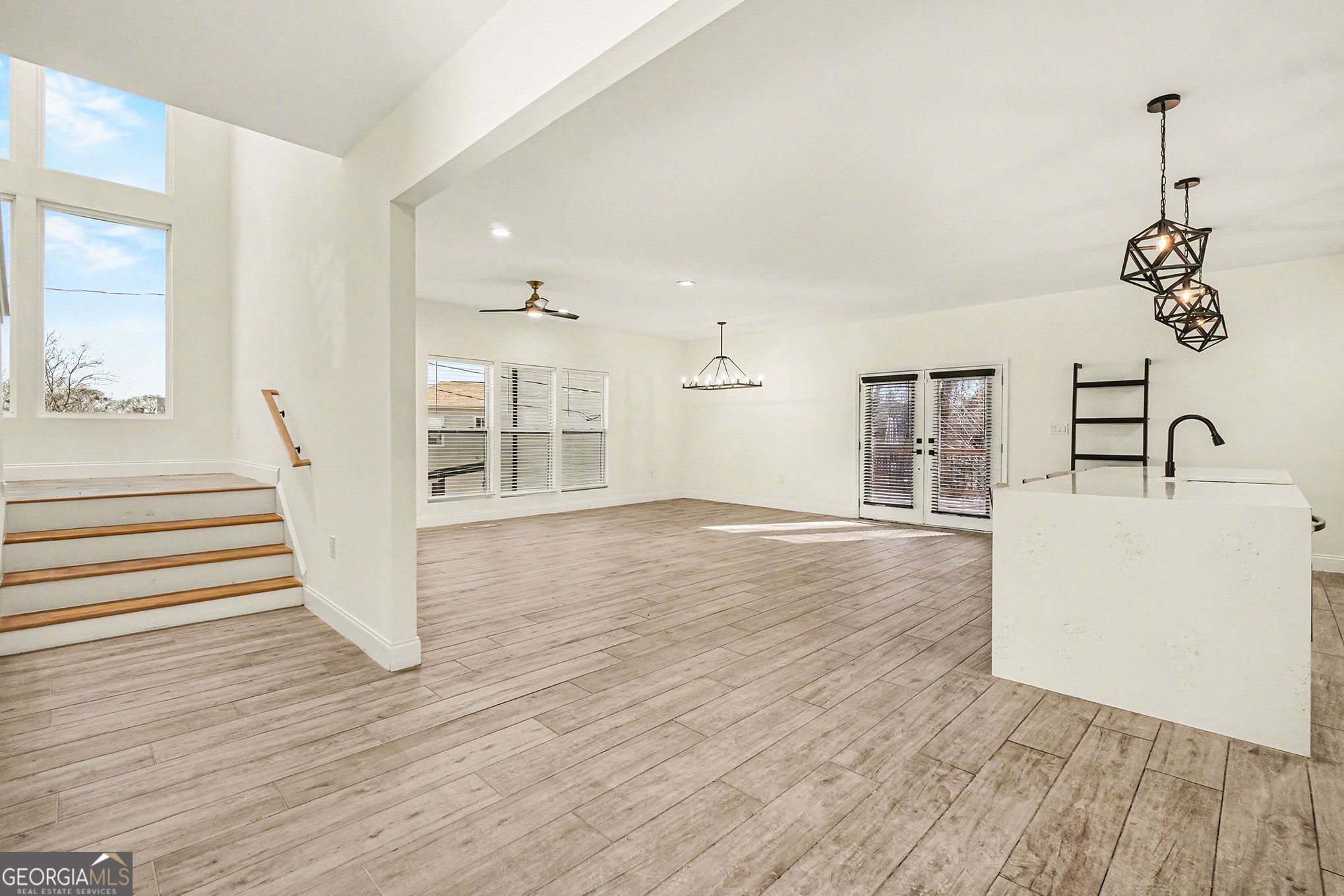 1480 Norris Place Northwest Atlanta, GA 30314 - Photo 12 of 30 a view of a room with wooden floor and windows