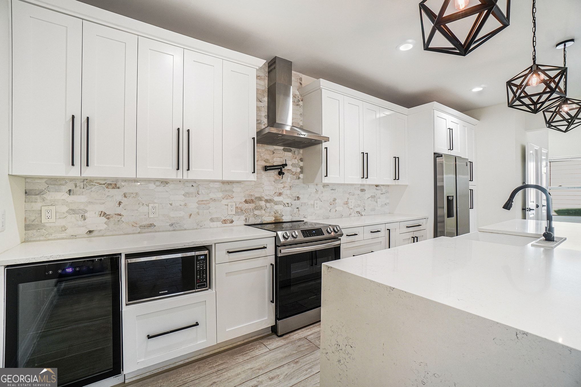 1480 Norris Place Northwest Atlanta, GA 30314 - Photo 16 of 30 a kitchen with stainless steel appliances granite countertop a stove a sink and white cabinets