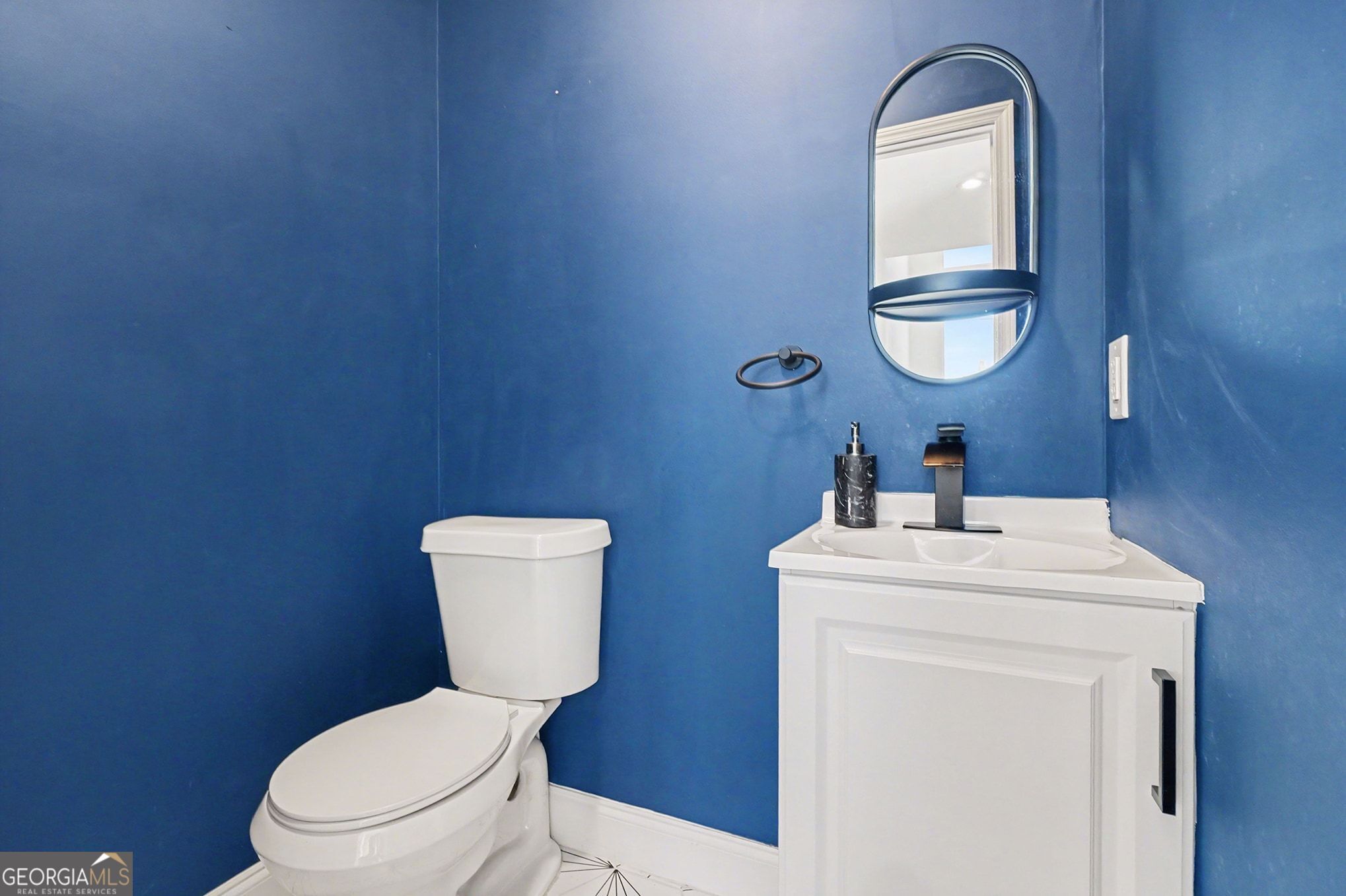 1480 Norris Place Northwest Atlanta, GA 30314 - Photo 17 of 30 a bathroom with a toilet a sink and mirror