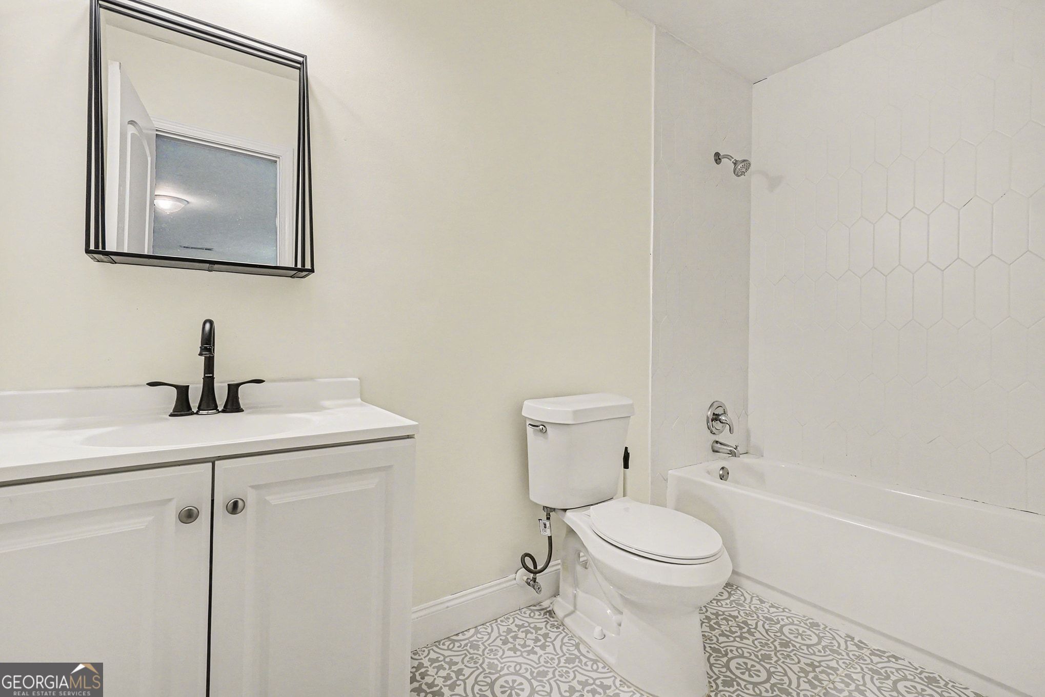 1480 Norris Place Northwest Atlanta, GA 30314 - Photo 23 of 30 a bathroom with a toilet a sink and mirror