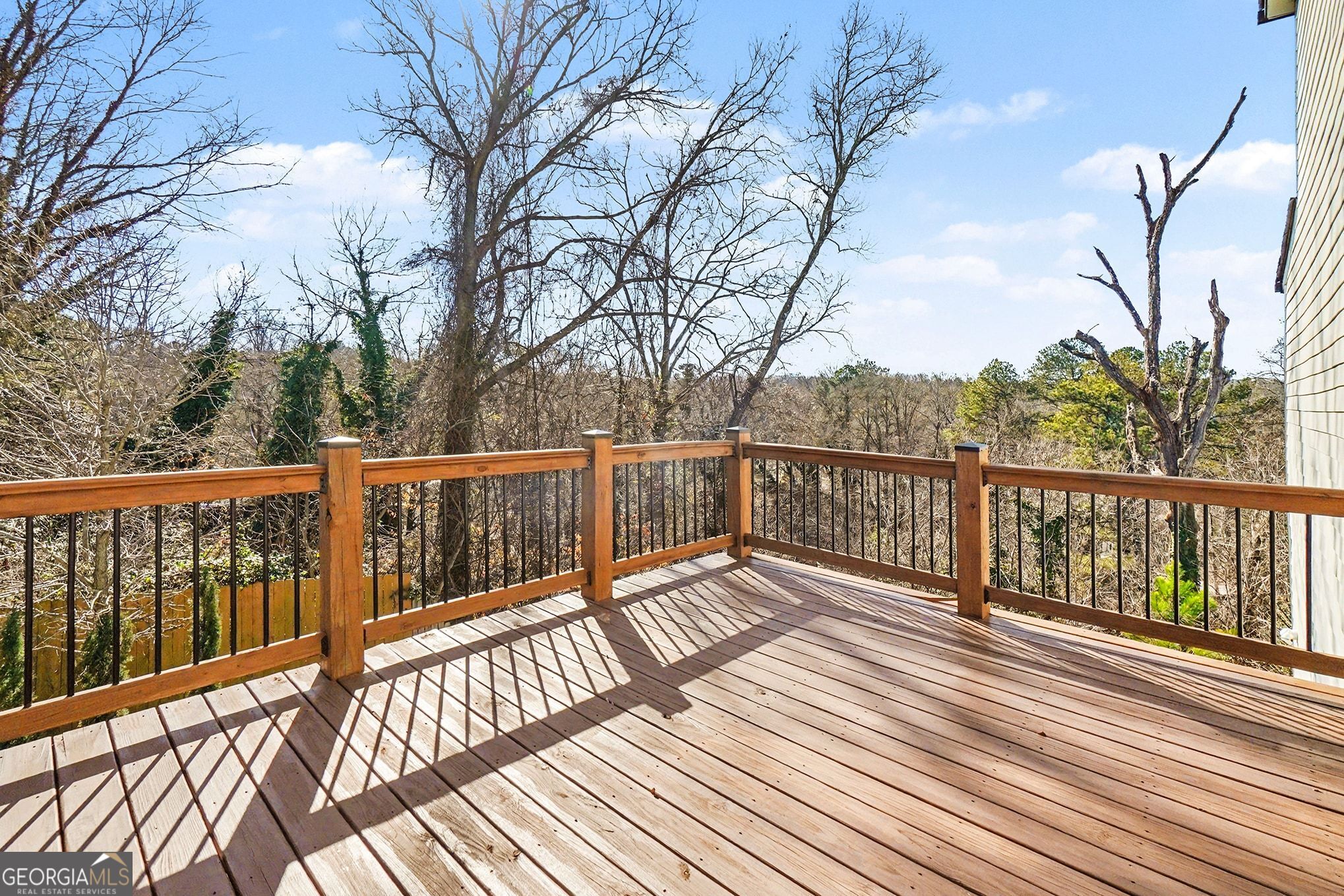 1480 Norris Place Northwest Atlanta, GA 30314 - Photo 24 of 30 a view of wooden balcony with wooden floor and fence