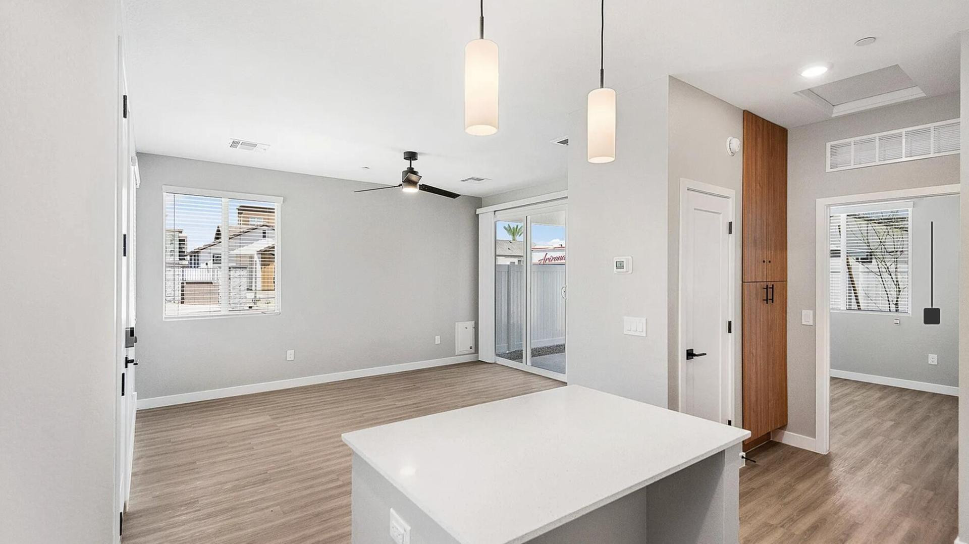 17365 West Lower Buckeye Road, Unit 2 Goodyear, AZ 85338 - Photo 18 of 18 a view of empty room with wooden floor
