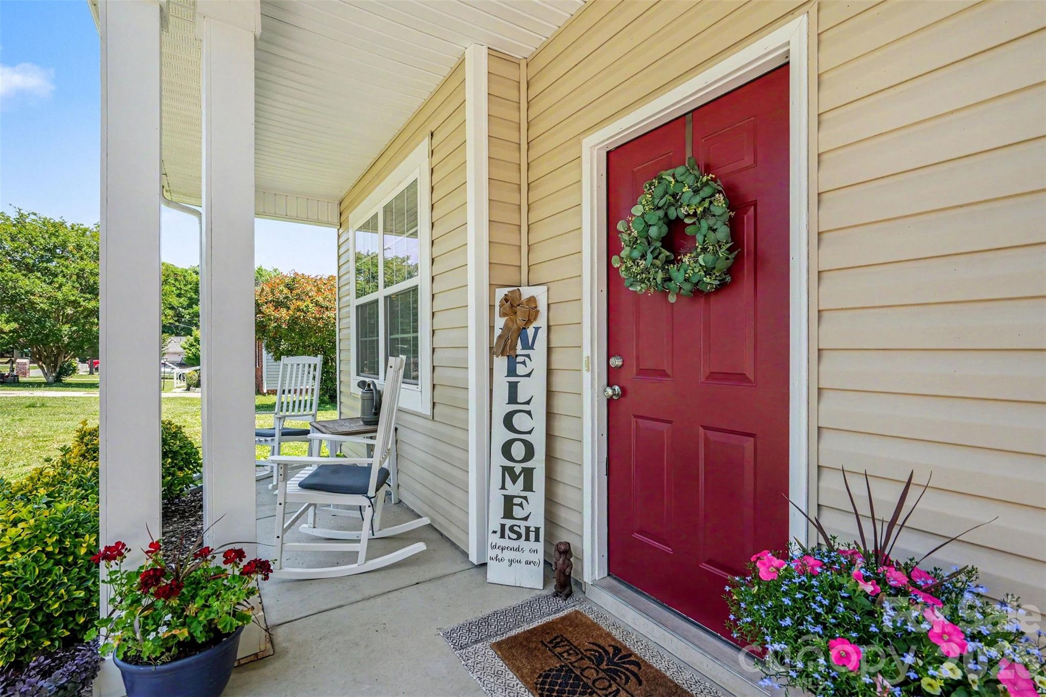 1610 Walter Hasty Road Monroe, NC 28110 - Photo 4 of 32 a view of a potted flower in front of a door
