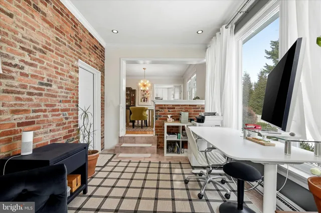a kitchen with stainless steel appliances a refrigerator and cabinets
