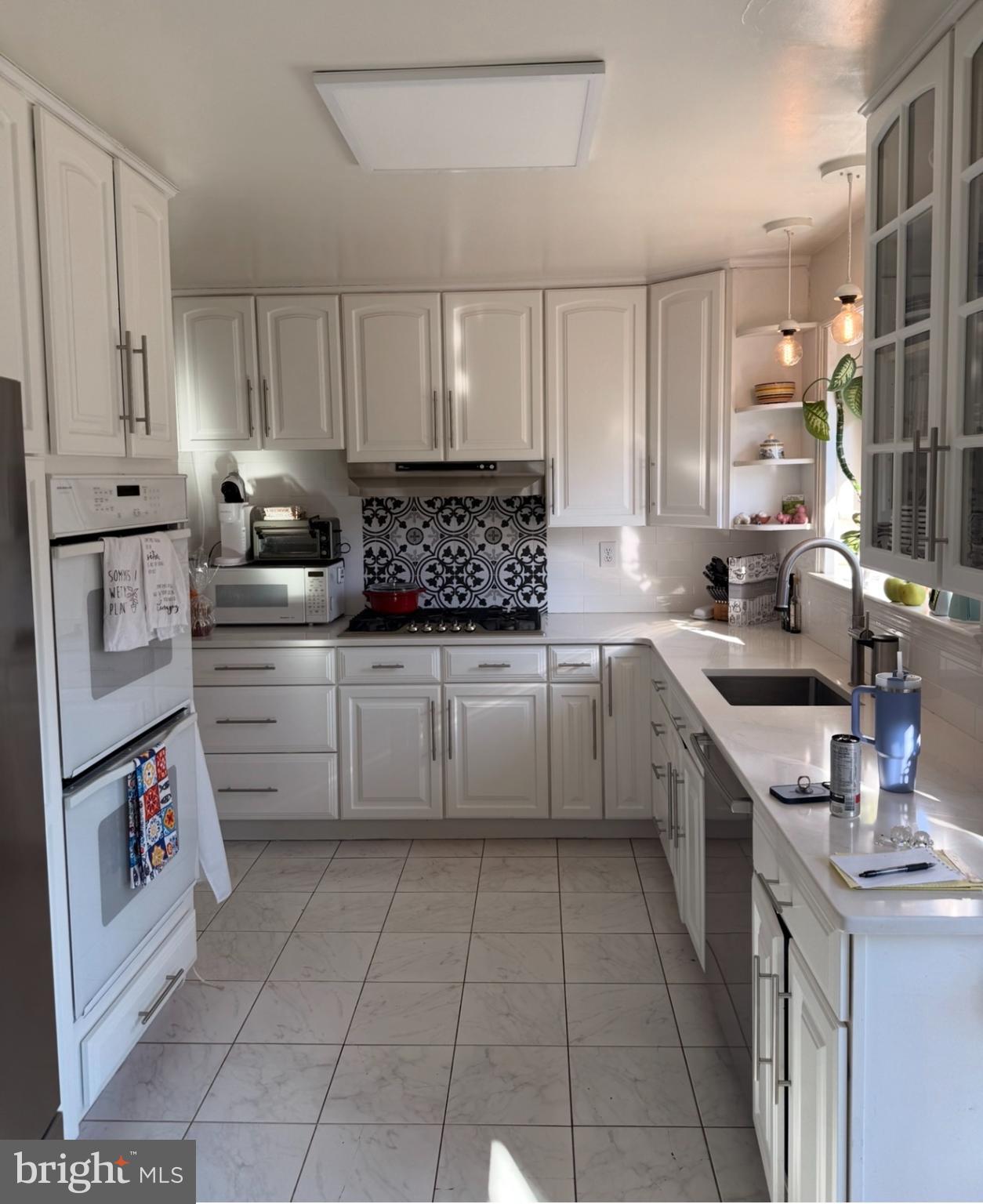 1201 Allendale Road McLean, VA 22101 - Photo 4 of 10 Bright and modern kitchen with sleek design.