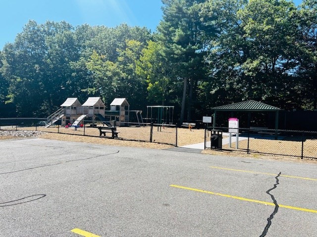 85 Ridgewood Lane, Unit 18 Gardner, MA 01440 - Photo 11 of 13 a view of a park with iron fence