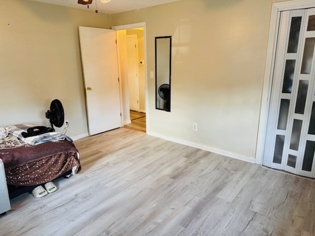 85 Ridgewood Lane, Unit 18 Gardner, MA 01440 - Photo 5 of 13 a bedroom with a bed and a mirror on dresser